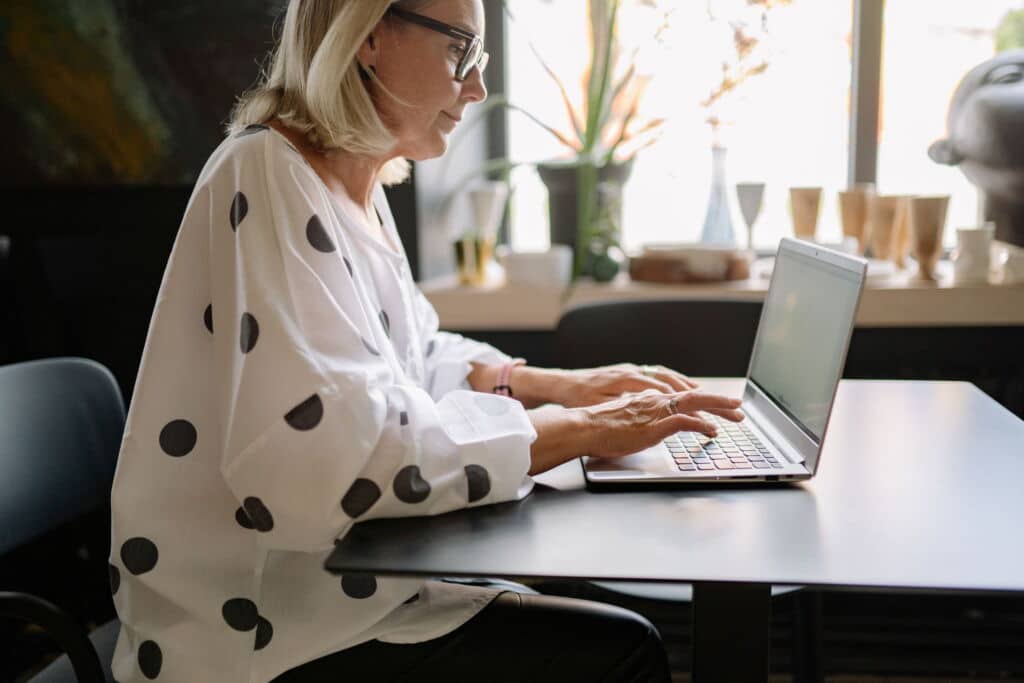 woman searching on a laptop