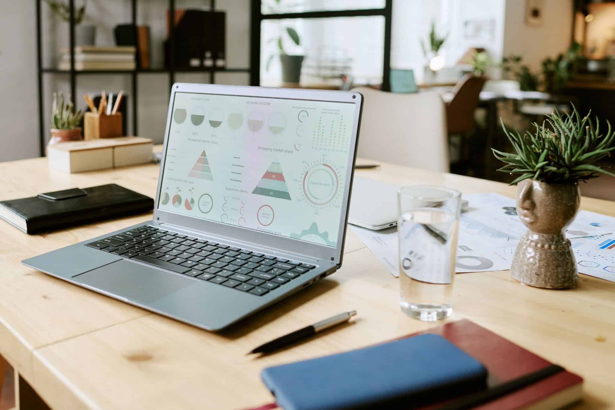 laptop with analytics reports
