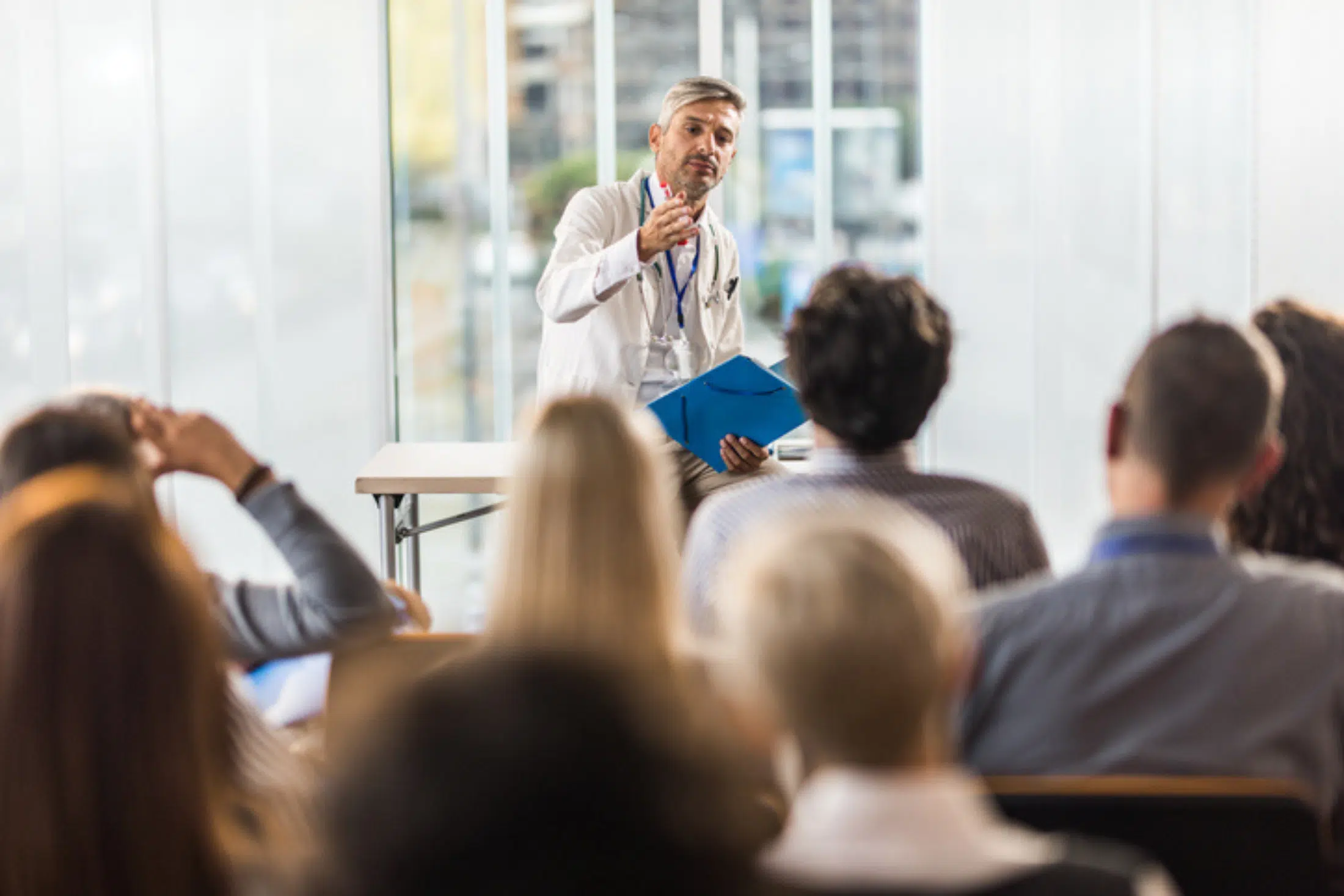 doctor speaking with group