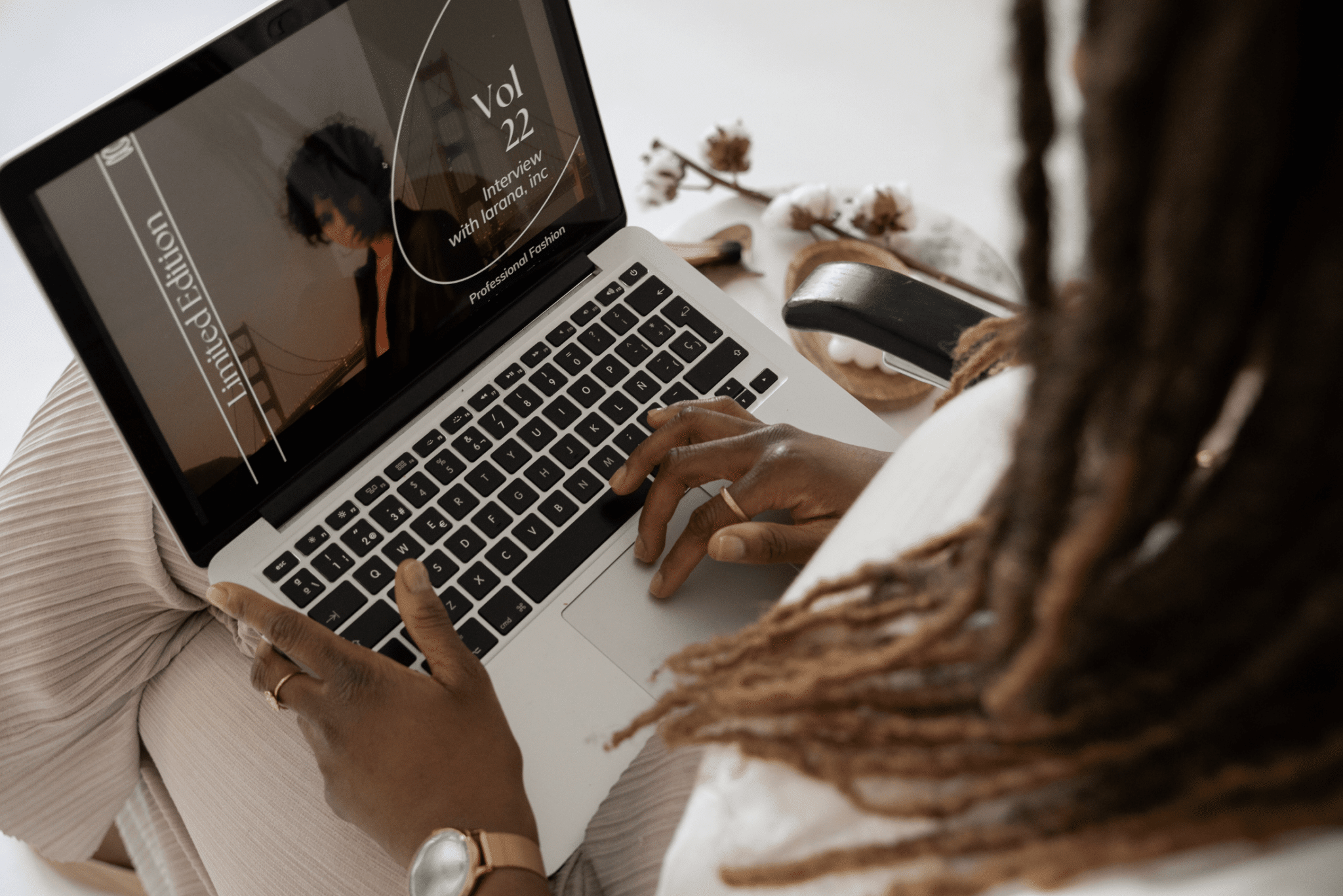 person using canva to design