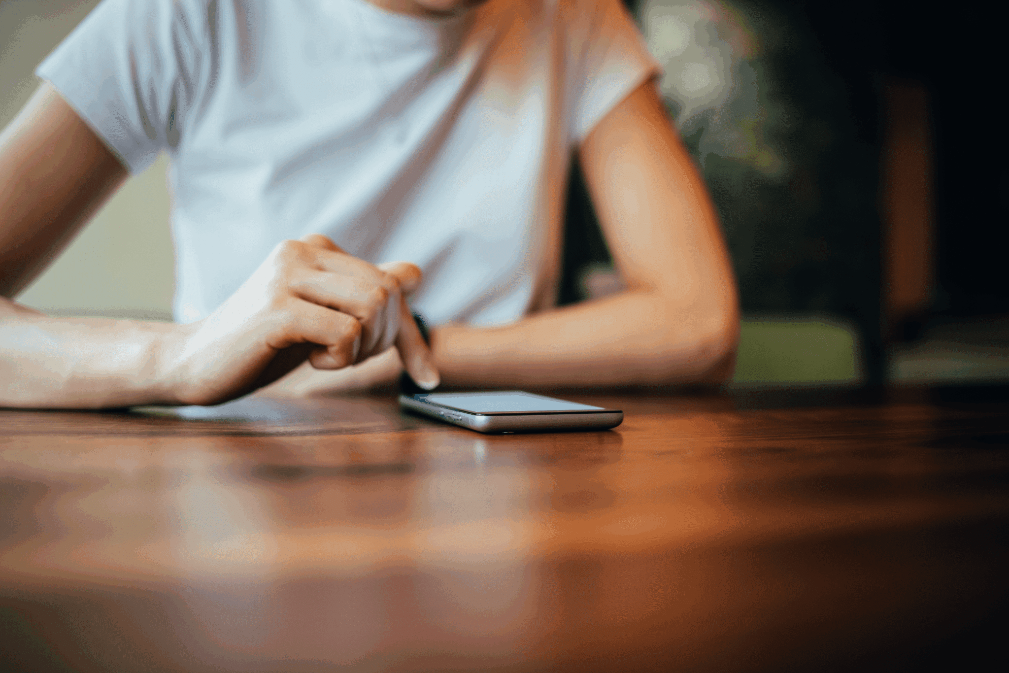 person scrolling Reddit on their phone person scrolling Reddit on their phone
