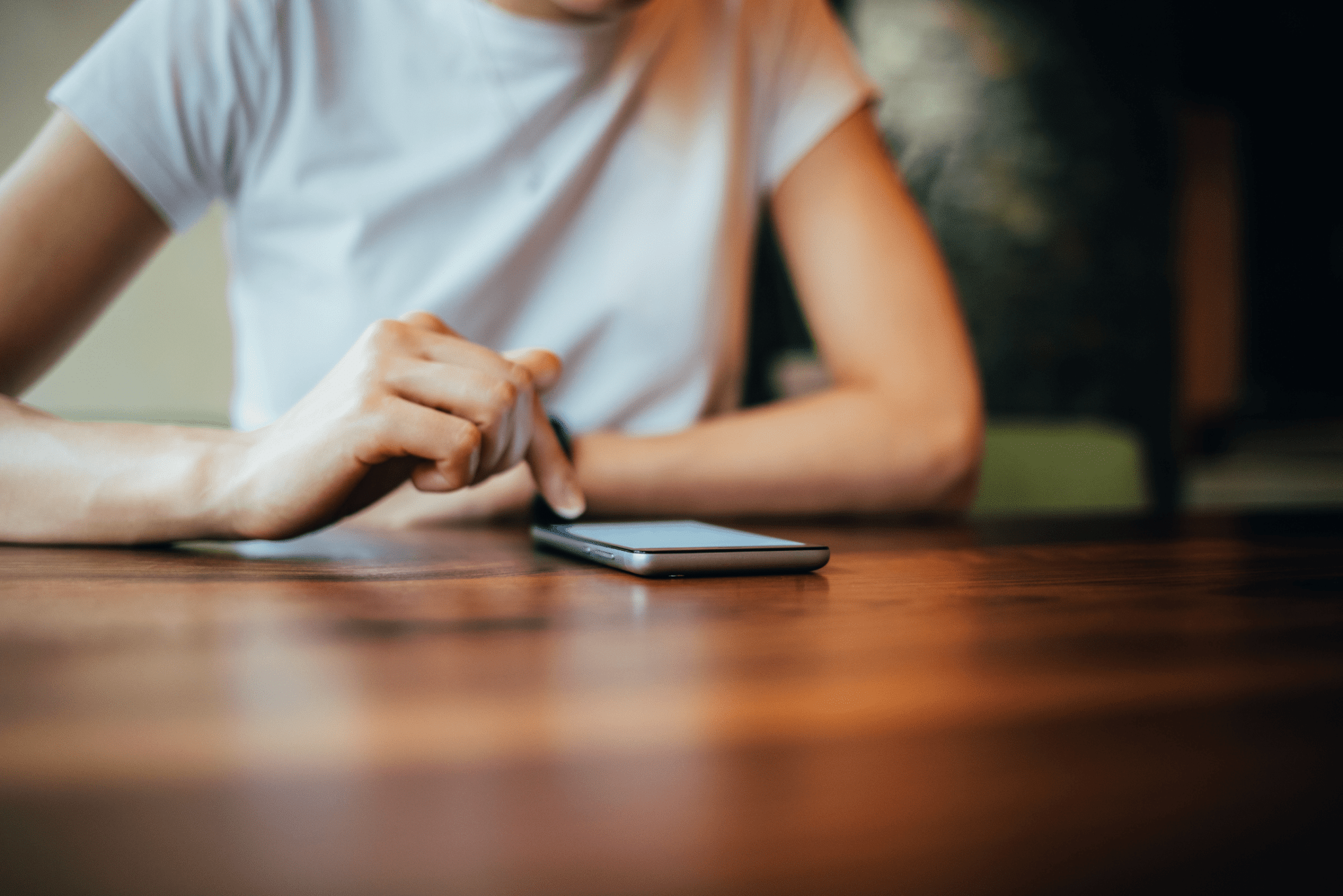 Person scrolling Reddit on their phone