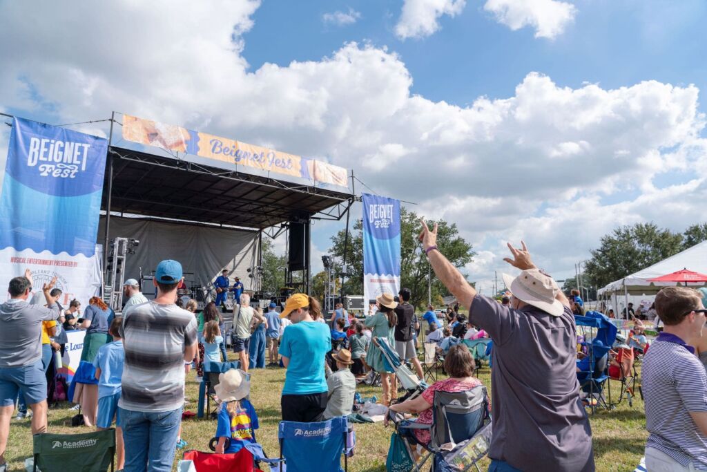 people enjoying live music at beignet fest