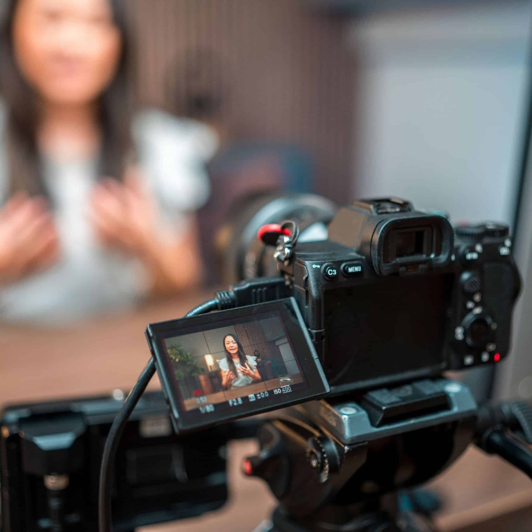 person recording video for social media