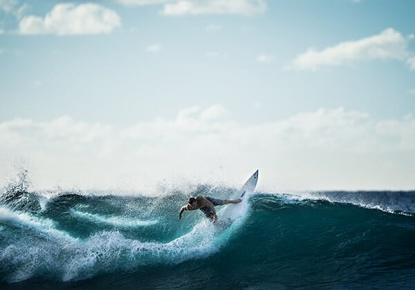 Photo of Man Surfing Uncompressed
